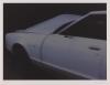 The third screenprint in Rosemarie Trockel's 'Singend kehrte ich heim (I returned home singing) (portfolio)' depicting a photograph of the front half of a white car.