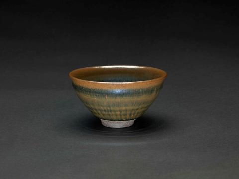 Artwork Tea bowl this artwork made of Stoneware, deep brown clay thrown with hare's fur tenmoku glaze, created in 1987-01-01