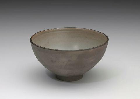 Artwork Bowl this artwork made of Thrown buff body earthenware with manganese oxide brushed exterior and pale grey glazed interior, created in 1956-01-01