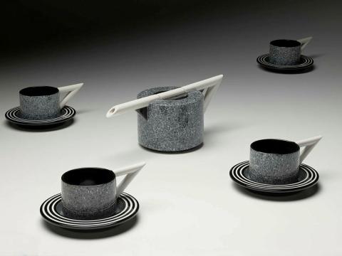 Artwork Tea-set:  Granite this artwork made of Slip-cast white earthenware with black, white and grey (spattered black) bands of glaze, created in 1987-01-01