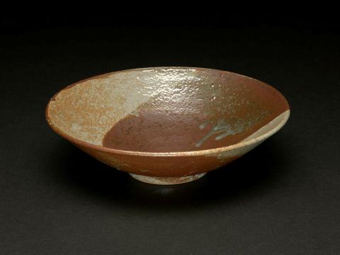 Artwork Bowl this artwork made of Stoneware, thrown, flaring shape with tongue of dark glaze over clear, created in 1975-01-01