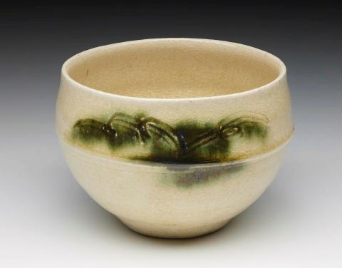 Artwork Tea bowl this artwork made of Stoneware, coarse white clay thrown with incised decoration;  yellow Seto glaze and green over incisions, created in 1990-01-01