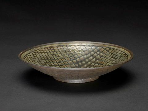 Artwork Bowl this artwork made of Stoneware, thrown with green and brown crocodile skin glaze, created in 1955-01-01